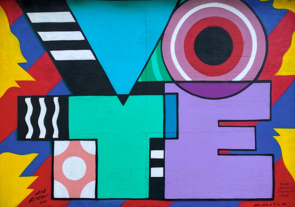 Das Wort &quotVote&quot ist als Graffiti auf eine Wand gesprüht.